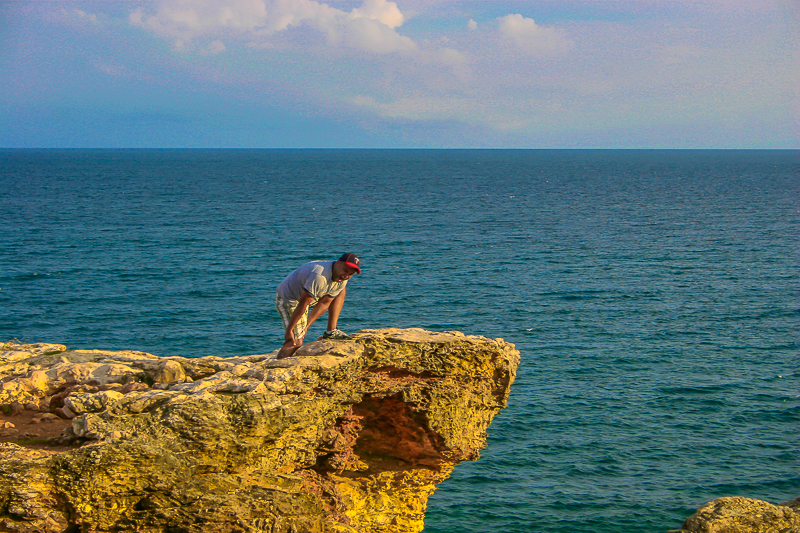 On the edge — a daring lookout on the limestone cliffs above the Caribbean Sea